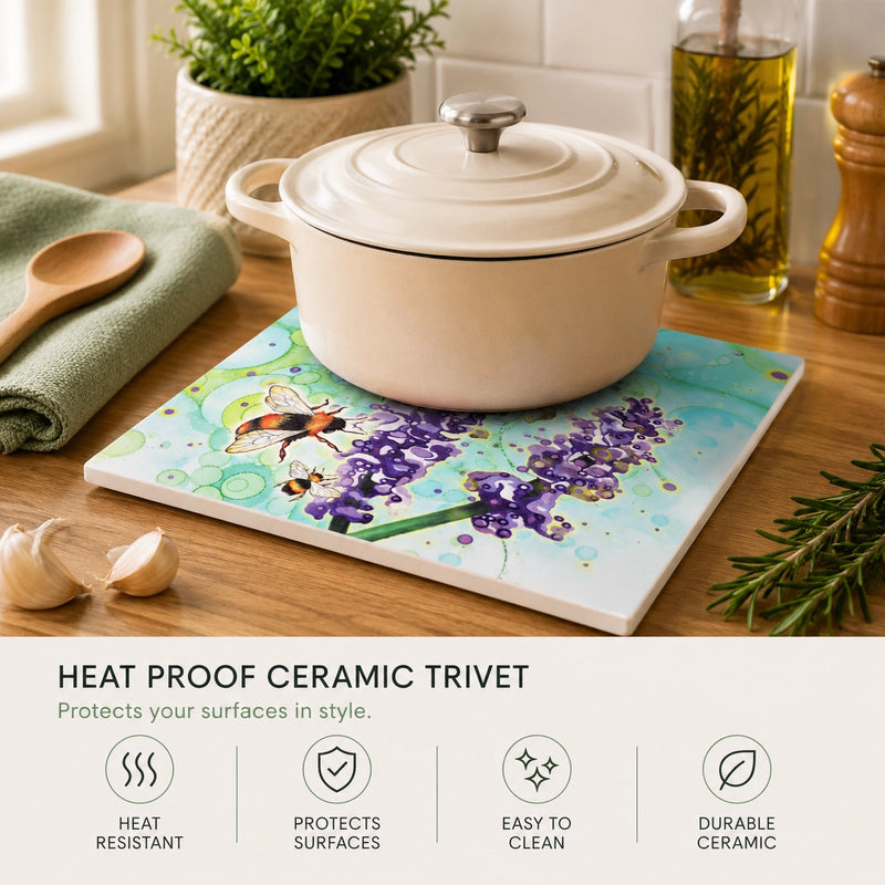 Bumblebee and Lavender ceramic trivet in use on wooden kitchen worktop with cream casserole dish, heat resistant and easy to clean infographic