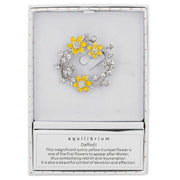 Equilibrium Radiant Daffodil Round Brooch in gift box with brand card showing daffodil sentiment