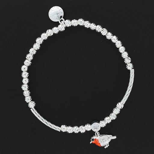 Equilibrium Robins Appear silver-plated beaded stretch bracelet with a robin charm and Cubic Zirconia connector on a dark background