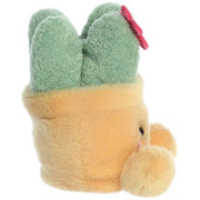 Seyla the Succulent Palm Pals plush, side view showing sage green succulent leaves and pink flower detail, white background