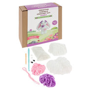 Contents of the Creative Crochet Chenille Bunny kit showing soft chenille yarn, hook, stuffing and instructions