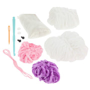 Contents of the Creative Crochet Chenille Bunny kit showing soft chenille yarn, hook, stuffing and instructions