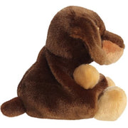 Houdini the Dachshund Palm Pals plush, side view showing chocolate brown body and caramel muzzle, white background