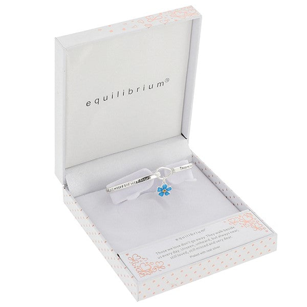 Silver plated Forget Me Not bangle with blue charm, presented in a gift box