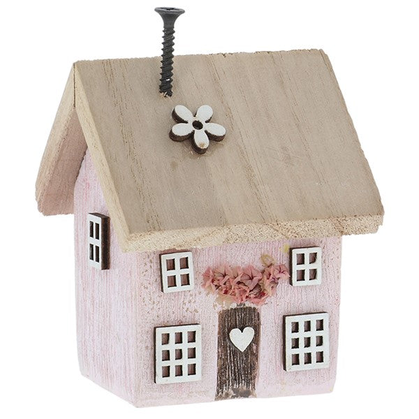 Spring Folk Art Cottage House ornament in pink pastel with flower and heart cut-out detail
