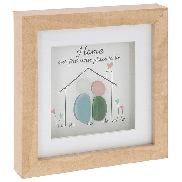Pebble glass art plaque in natural wood frame featuring colourful glass pebble figures in a house scene with the sentiment Home our favourite place to be