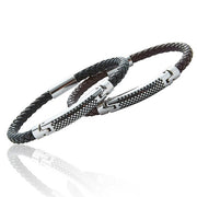 Close-up of herringbone leather weave and silver plating on EQ For Men braceletS