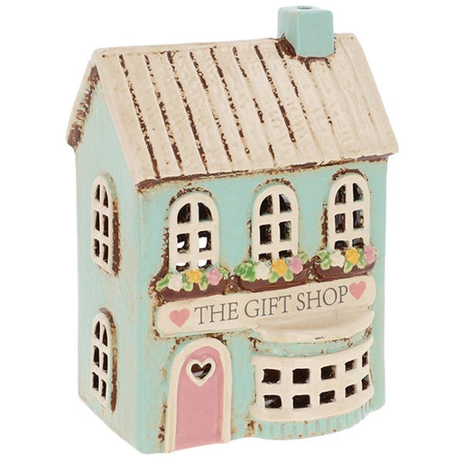 Pale green handcrafted ceramic gift shop tealight holder with pink door, bay window and floral window boxes — Shudehill Village Pottery Cottage Collection