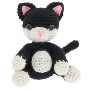 Close-up of crocheted black and white cat showing stitch detail and texture from the Shudehill Creative Crochet kit