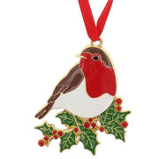 Close-up of robin on holly Christmas tree decoration with crystal-effect berries and red ribbon hanger, gold-tone finish