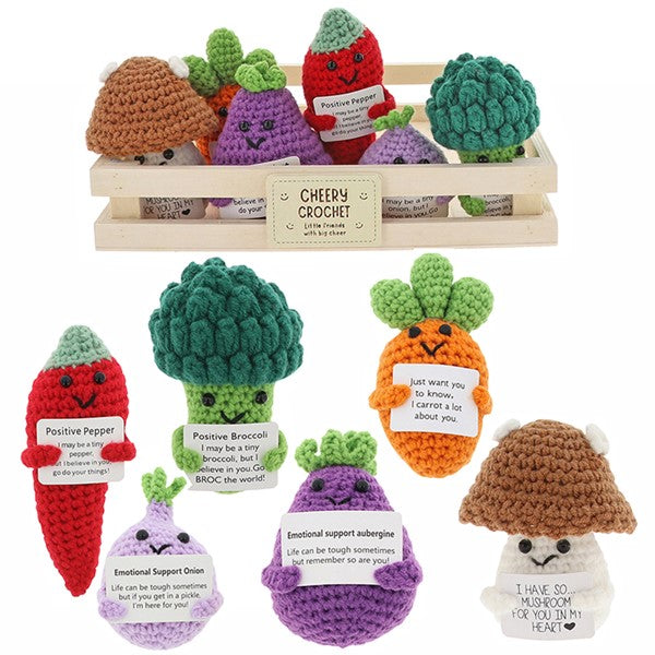 Cheery Crochet Vegetables collection presented together in a wooden box, and also a close up out of the box  on a white background