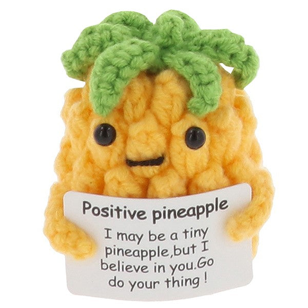 Cheery Crochet Positive Pineapple, handmade crochet fruit character, presented on a white background