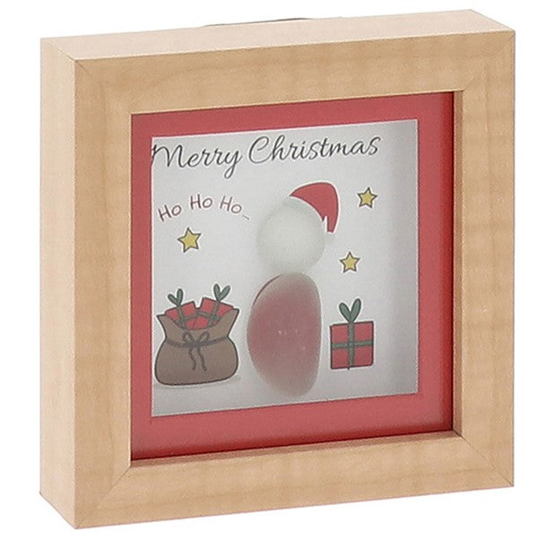 A small square natural wood box framed pebble art picture with a pebble Santa figure wearing a red hat, an illustrated gift sack, a wrapped present and gold stars, with the sentiments "Merry Christmas" and "Ho Ho Ho..."
