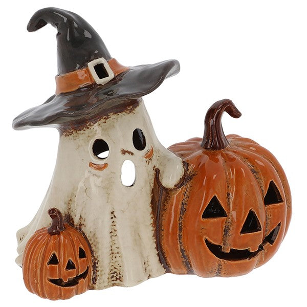 Village Pottery ghost and pumpkins tealight holder — friendly ghost in a witch's hat with orange buckle band, flanked by two carved jack-o'-lantern pumpkins with cut-out features