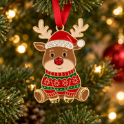 Rudolph Christmas tree hanging decoration with golden antlers and red nose, hanging on a Christmas tree with warm golden bokeh fairy lights