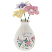 Friends Always flower vase with three pastel flower stems in pink, yellow and lilac, white rounded vase with Friends Always script and wildflower illustration, front view