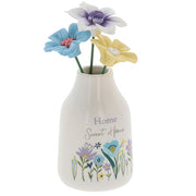 Home Sweet Home flower vase angled view showing wildflower meadow illustration detail and decorative flower stems