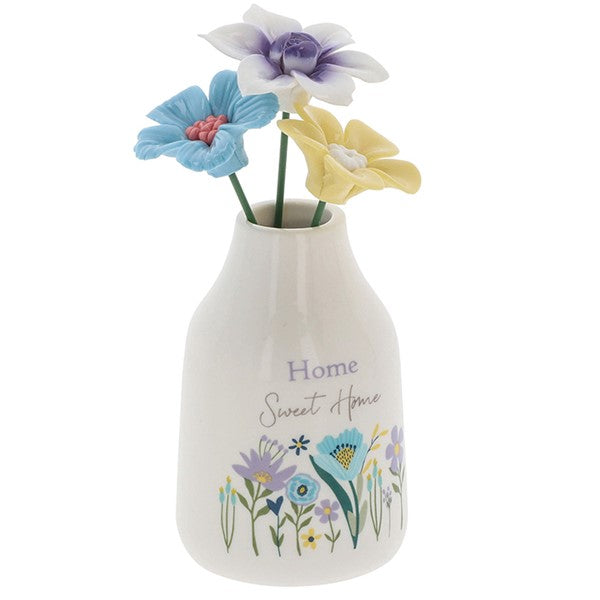 Home Sweet Home flower vase angled view showing wildflower meadow illustration detail and decorative flower stems