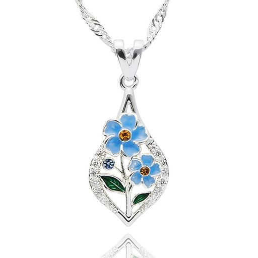 Equilibrium Forget Me Not Teardrop Silver Plated Necklace with blue flowers, amber coloured crystal-effect centres, blue crystal-effect stone and green leaf stem detail