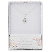 Equilibrium Forget Me Not Teardrop Silver Plated Necklace shown in gift box with forget-me-not sentiment