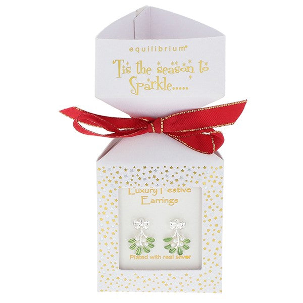Equilibrium Christmas mistletoe drop earrings with green leaf and white berry detail, presented in a luxury white cracker-style gift box with red ribbon bow