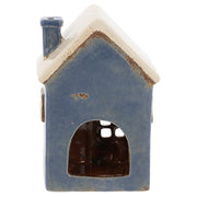 Rear view of Village Pottery village vets tea light holder showing cut-out arch for tea light access and plain blue exterior