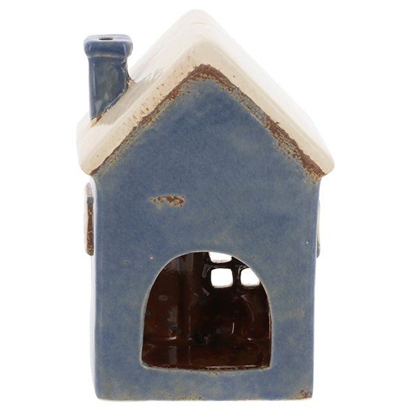 Rear view of Village Pottery village vets tea light holder showing cut-out arch for tea light access and plain blue exterior