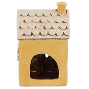 Rear view of Village Pottery Boutique ceramic tea light holder showing arched tea light opening