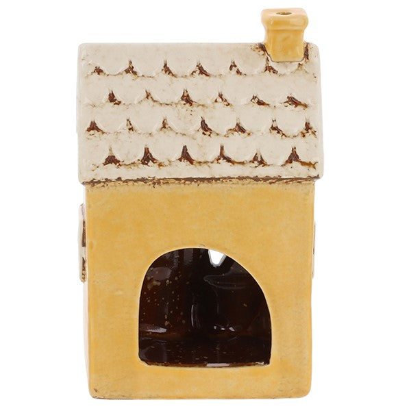 Rear view of Village Pottery Boutique ceramic tea light holder showing arched tea light opening