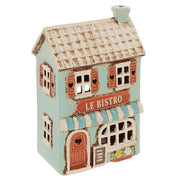 Village Pottery ceramic Le Bistro tea light holder, duck egg blue two-storey building with tiled roof, terracotta shutters and door with heart details, and blue and white striped awning