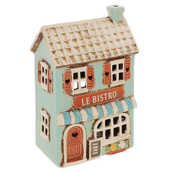 Village Pottery ceramic Le Bistro tea light holder, duck egg blue two-storey building with tiled roof, terracotta shutters and door with heart details, and blue and white striped awning