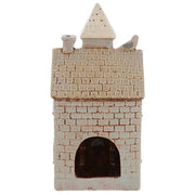 Rear view of Village Pottery town hall tea light holder showing cut-out arch for tea light access and pointed tower detail