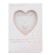 Equilibrium heart pendant necklace displayed in a Radiance Collection presentation box
