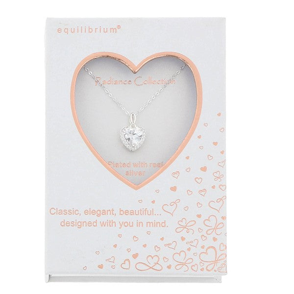 Equilibrium heart pendant necklace displayed in a Radiance Collection presentation box