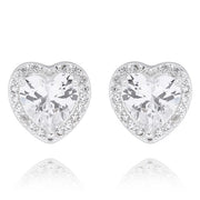 Equilibrium silver plated heart stud earrings with faceted crystal-effect centres and smaller sparkling details around the edges.