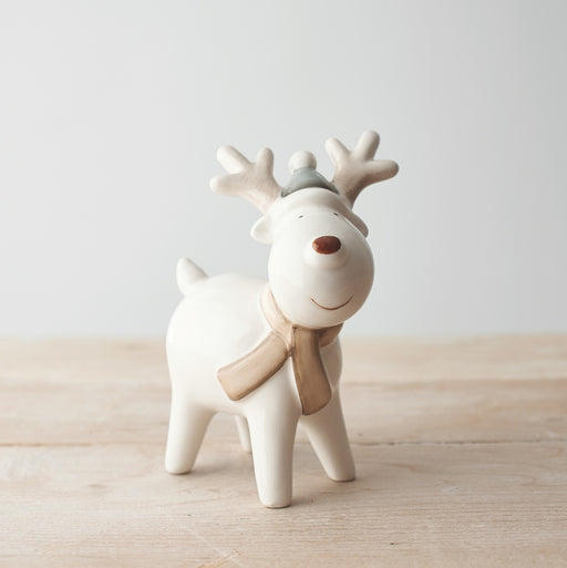Standing reindeer Christmas decoration in a neutral finish with red nose, little grey hat, scarf and antlers, 15cm tall⠋

