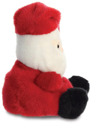 Side view of the Santa Claus Palm Pal showing the red suit dark fluffy feet and red hat with white trim