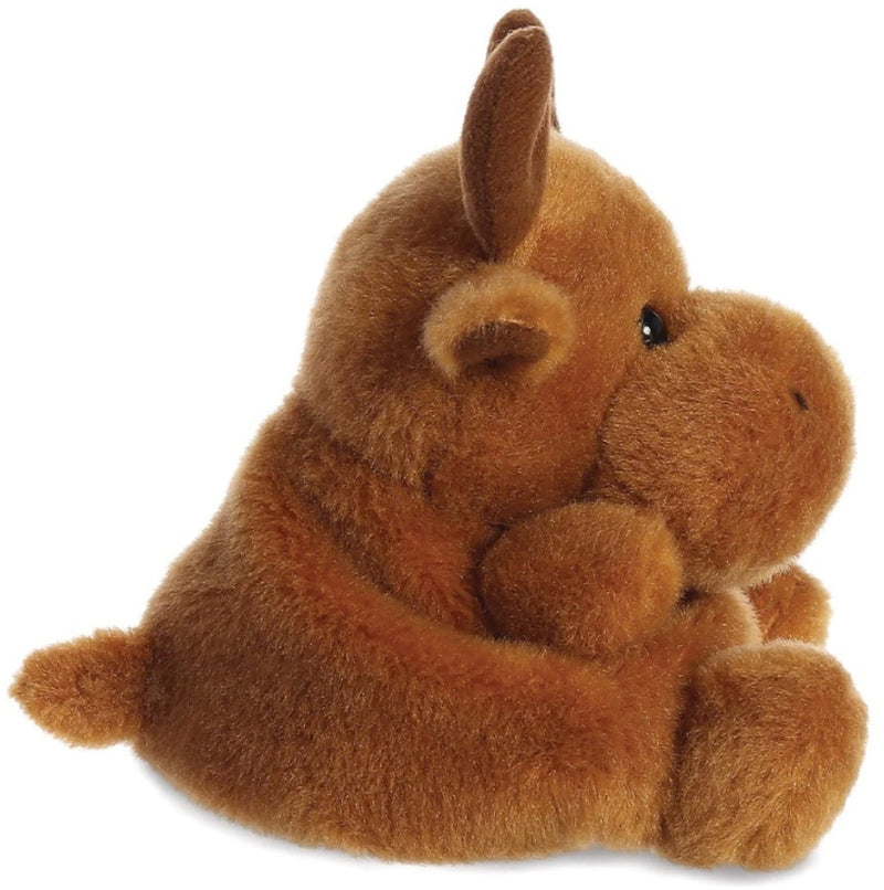 Side view of Cinnamon the Reindeer Palm Pal showing the warm golden-brown plush body and fluffy feet