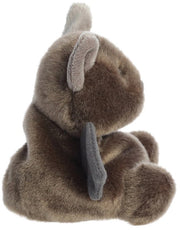 Side view of Luna the Bat Palm Pal showing the dark grey wing and fluffy brown body