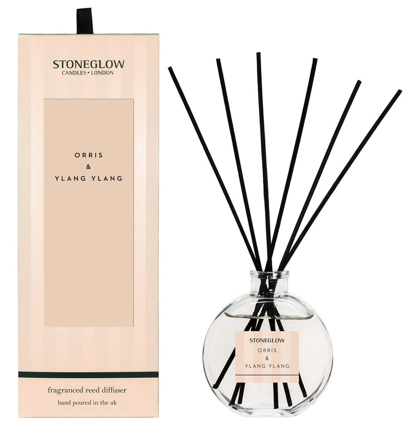 Stoneglow Modern Classics Orris and Ylang Ylang Reed Diffuser in globe glass vessel with black reeds, shown with blush pink gift box