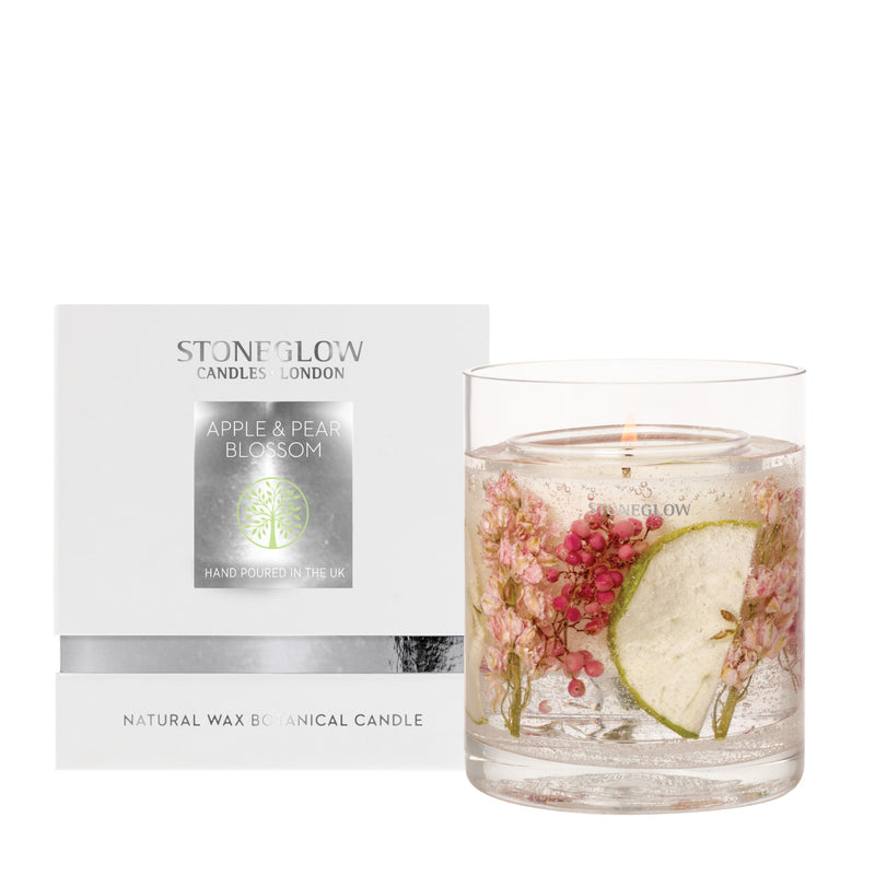 Stoneglow Nature's Gift Apple and Pear Blossom natural wax botanical candle in gel tumbler with dried botanicals and fruit slices, shown with white gift box