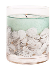 Close-up of Stoneglow Nature's Gift Ocean gel tumbler candle showing seashells and natural wax blend