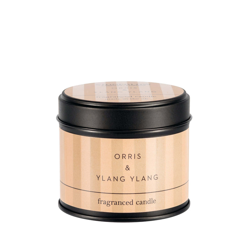 Stoneglow Modern Classics Orris and Ylang Ylang black candle tin with warm blush label, lid on, shown on white background