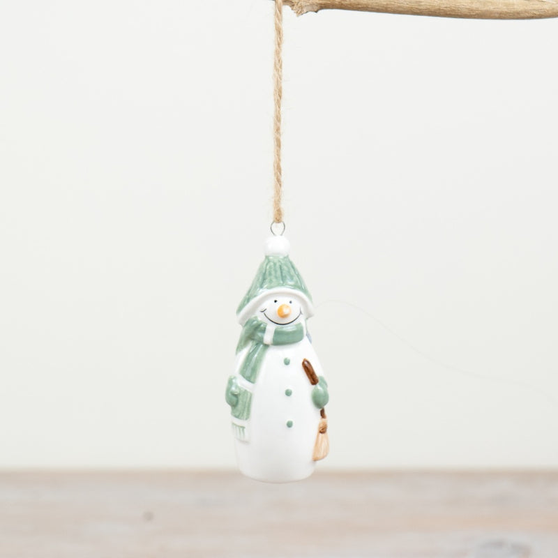 Hanging snowman Christmas tree decoration in sage green hat, scarf and mittens, holding a broom, with jute string hanger, 8cm