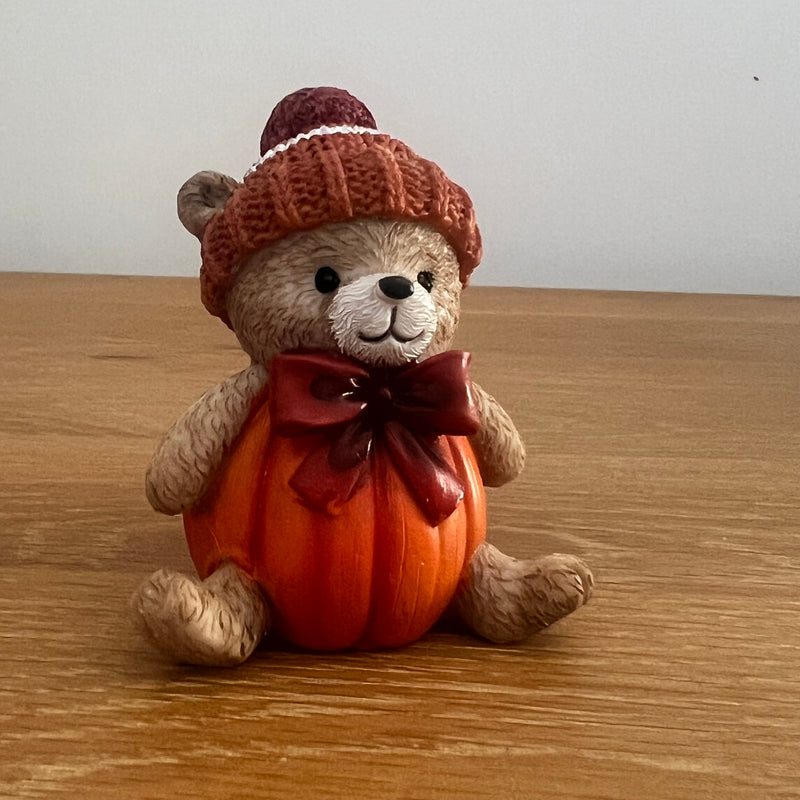Harvest Home resin pumpkin bear figurine with bobble hat, sitting with a round pumpkin body and bow