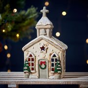 Stoneware Christmas church tealight holder with cross-topped steeple, festive wreath and snow-effect roof, Stoneware Country Cottage Collection