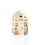 Front view of stoneware greenhouse tealight holder with striped roof, heart cutout and embossed flowers and plants, Stoneware Country Cottage Collection