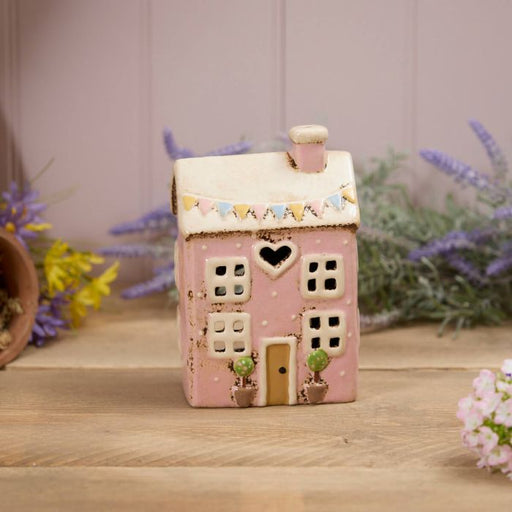 Pink stoneware cottage tealight holder with heart cutout, embossed pastel bunting and potted topiary trees, Stoneware Country Cottage Collection