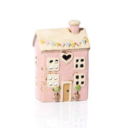  Front view of pink stoneware cottage tealight holder with cream roof, heart cutout and pastel bunting detail, Stoneware Country Cottage Collection