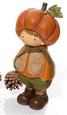  A resin pumpkin boy figurine wearing a pumpkin hat with stalk and leaf detail, textured gilet and trousers, brown boots, holding a pinecone, on a white background